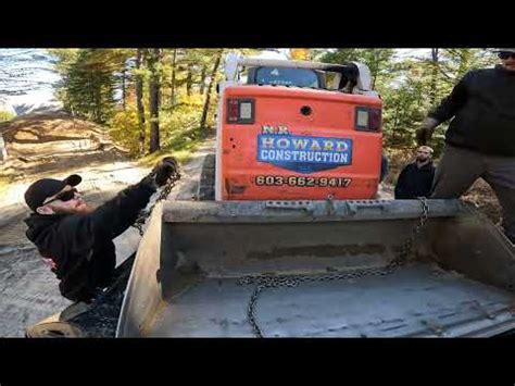 how to tow a broken down skid steer|moving skid steer without running.